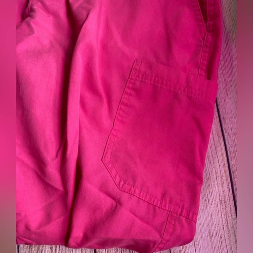 UA Women’s Yoga Waistband Scrub Pants Fuchsia